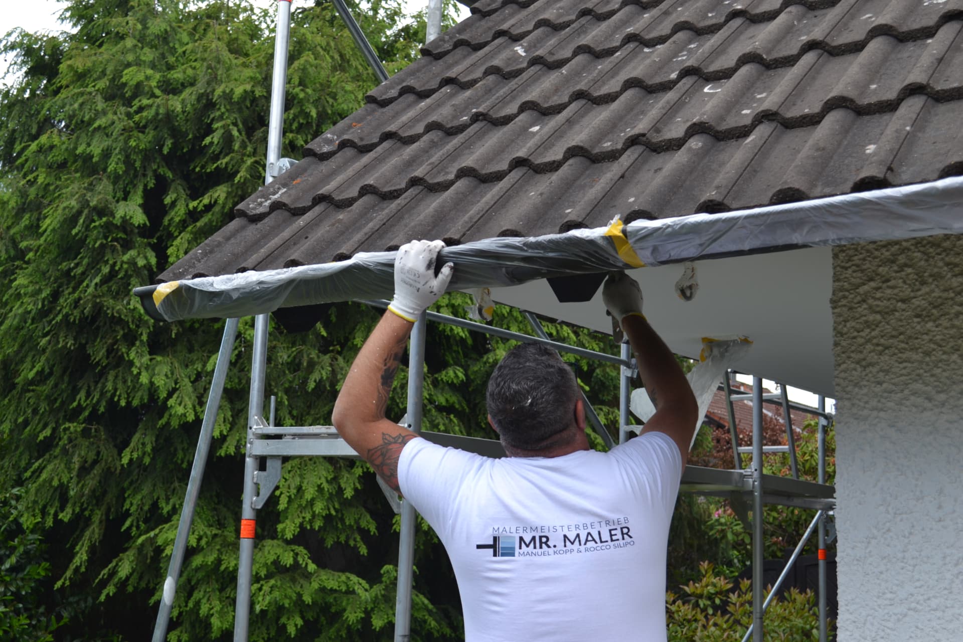 Malerteam von Mr. Maler bei der Arbeit in Augsburg